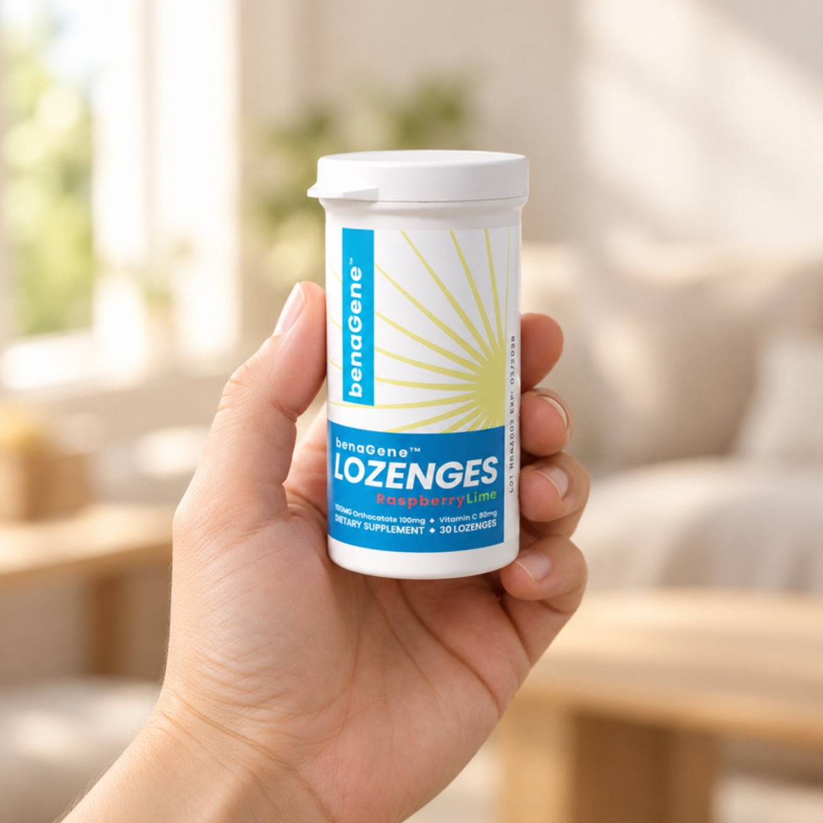 benaGene Oxaloacetate Lozenges held in an adult hand to show its size