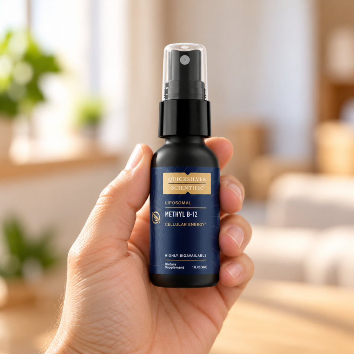 Quicksilver Scientific Liposomal Methyl B-12 held in an adult hand to show its size
