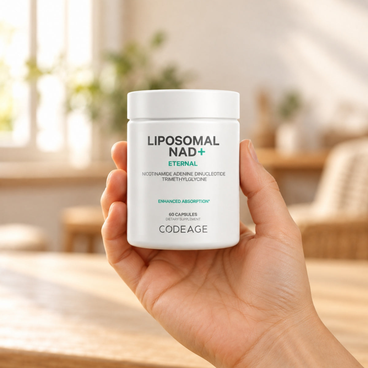 Codeage Liposomal NAD+ held in an adult hand to show its size
