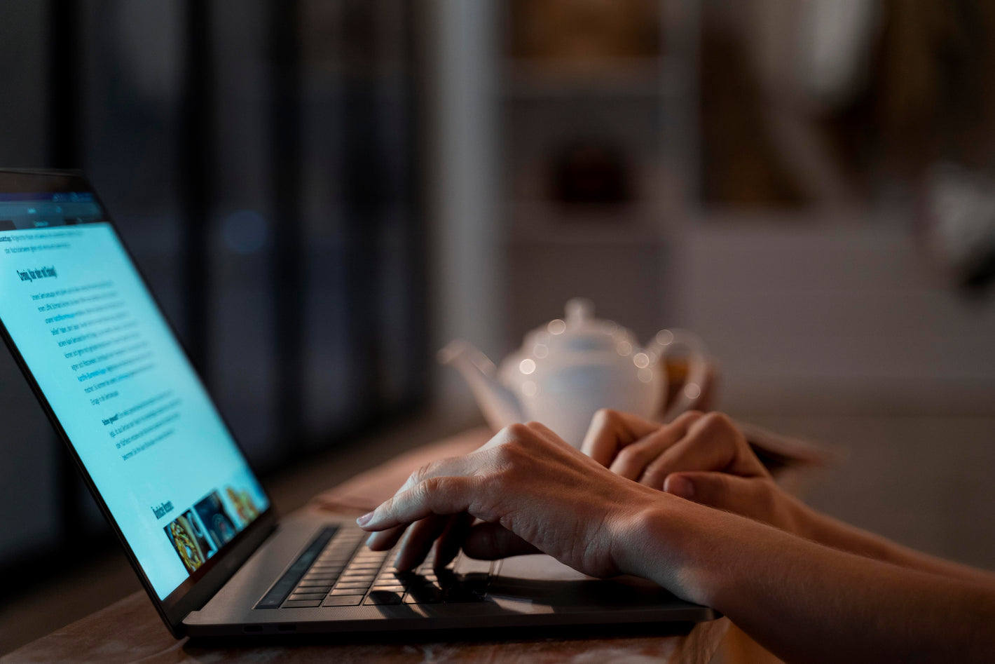 Person researching and writing on a laptop at home in a calm, focused environment – symbolizing knowledge and support during long Covid recovery