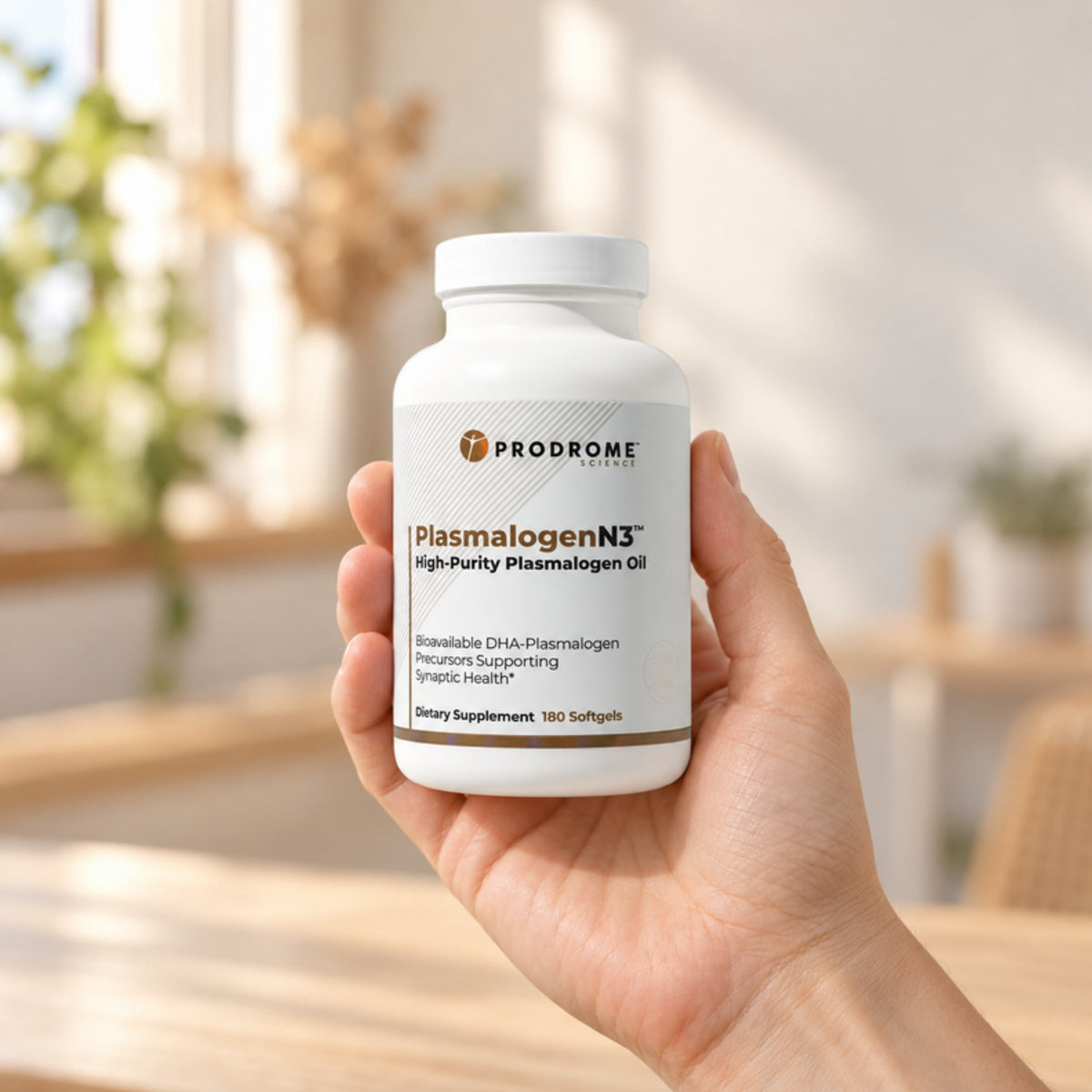 Prodrome Sciences PlasmalogenN3 Softgels held in an adult hand to show its size