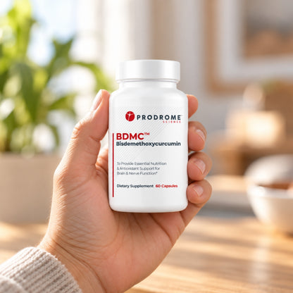 ProdromeBDMC Curcumin 60 Capsules by Prodrome Sciences held in an adult hand to show its size